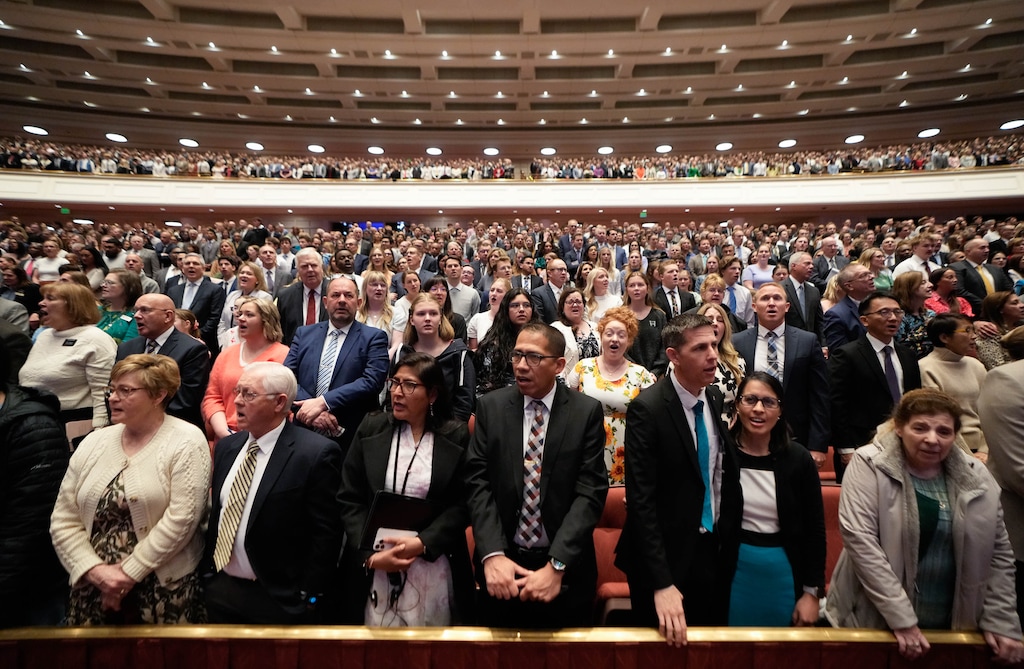(Francisco Kjolseth | The Salt Lake Tribune) Congregants sing a hymn at General Conference in early April 2026. A number of Latino and Latina Latter-day Saints want their church leaders to speak out more on U.S. immigration policies.