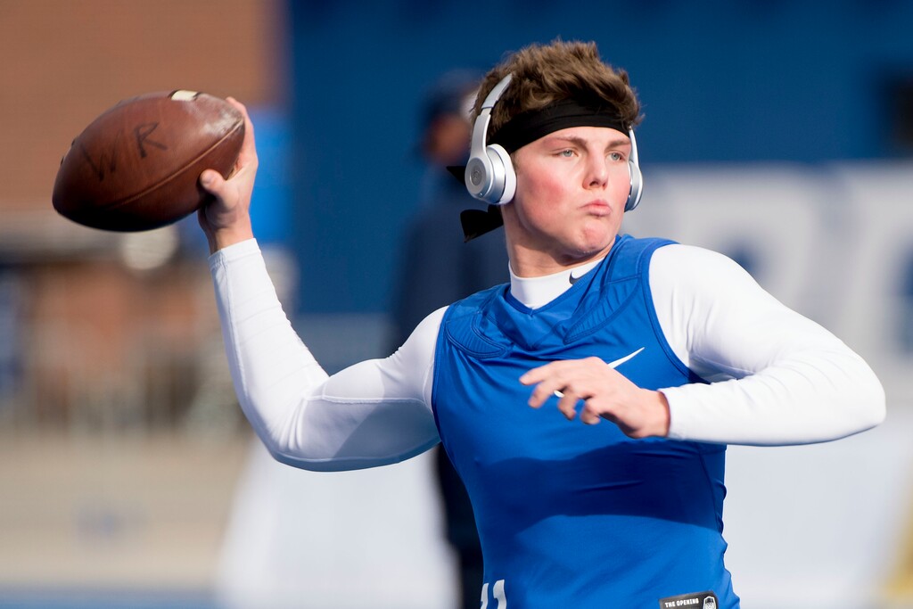 (Jeremy Harmon  |  Tribune file photo) Brigham Young Cougars quarterback Zach Wilson (11) throws the ball as BYU warms up before facing the Western Michigan Broncos in the Famous Idaho Potato Bowl in Boise, Idaho, on Friday, Dec. 21, 2018.