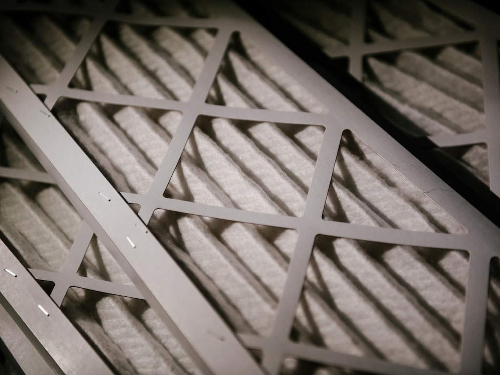 (Grant Hindsley | The New York Times) MERV-13 filters ready for installation in an office building in Seattle, on Dec. 7, 2021.