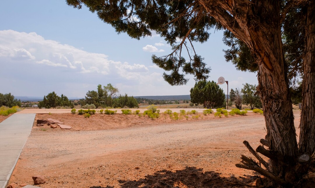 (Leah Hogsten  |  The Salt Lake Tribune) The basketball court outside the Navajo Mountain Clinic also serves as a helipad to transport patients in critical condition, Aug., 25, 2020. The Navajo Mountain UNHS clinic serves roughly 500 people in the Navajo Mountain tribal chapter and is run by a staff of Diné women.