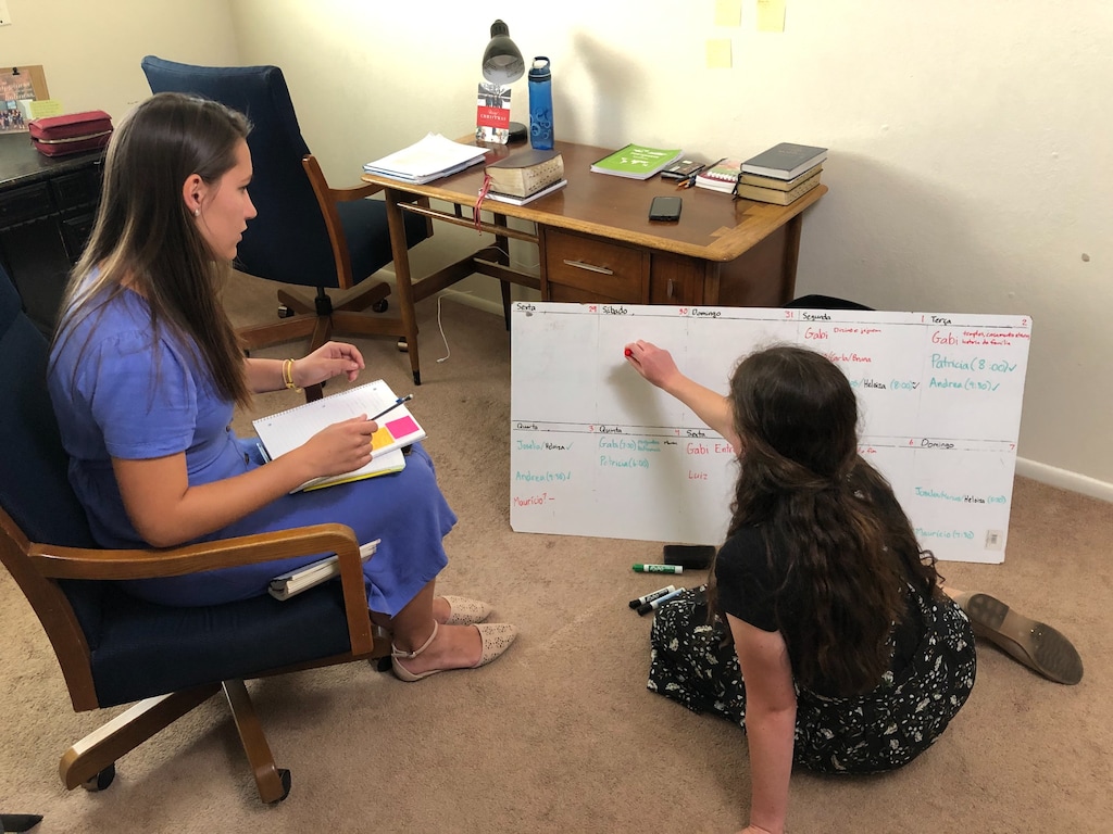 (Photo courtesy of The Church of Jesus Christ of Latter-day Saints)
Two missionaries who were serving in Brazil have been reassigned to a Portuguese-speaking congregation in Salt Lake City. Mauri Dobbs, left, and Hannah Davidson make a plan for the week in their apartment, Thursday, May 28, 2020.