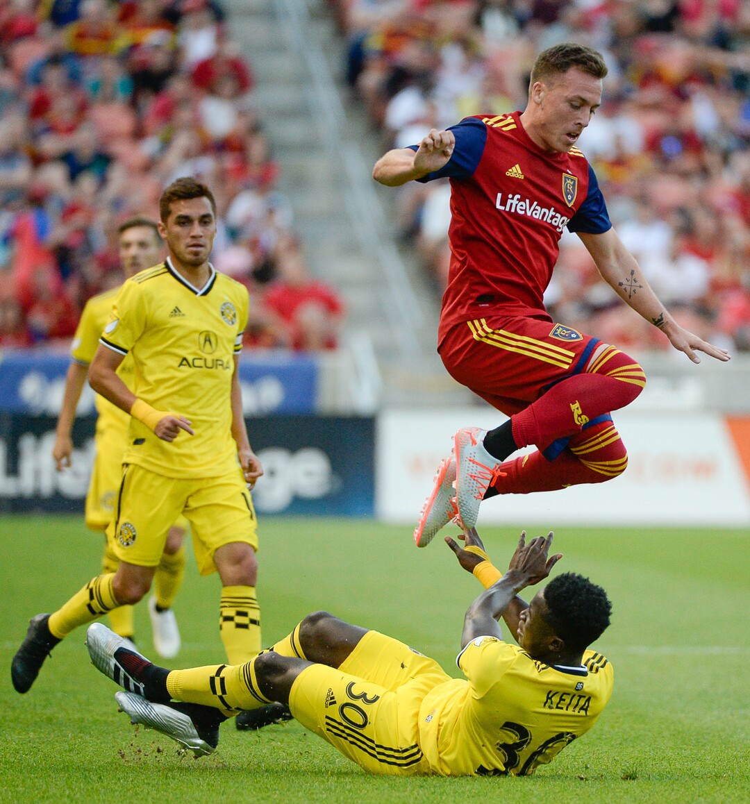 (Francisco Kjolseth  |  The Salt Lake Tribune)  Real Salt Lake forward Corey Baird (17) goes over the top of Aboubacar Keita (30) as Real Salt Lake hosts Columbus Crew SC, in MLS Soccer at Rio Tinto Stadium in Sandy, Utah on Wed, July 3, 2019.