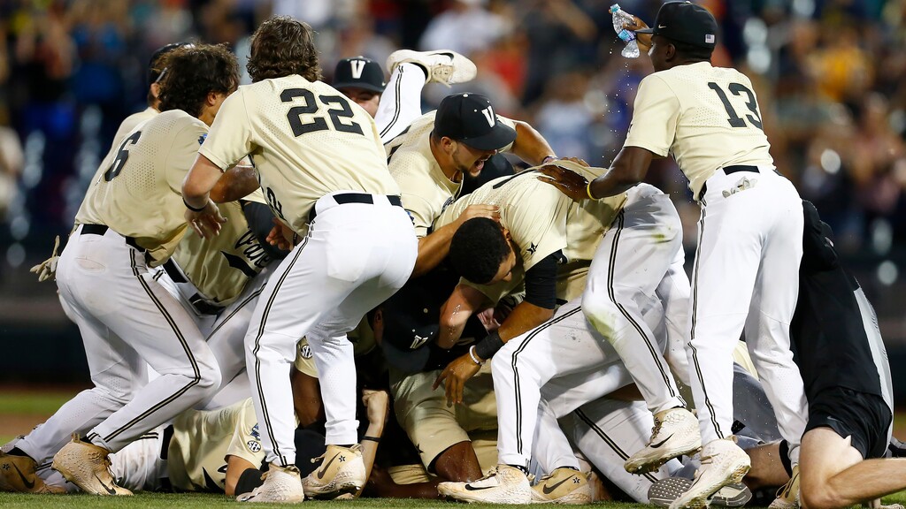 Vanderbilt players celebrate after defeating Michigan in Game 3 of the NCAA College World Series baseball finals in Omaha, Neb., Wednesday, June 26, 2019. (AP Photo/John Peterson)