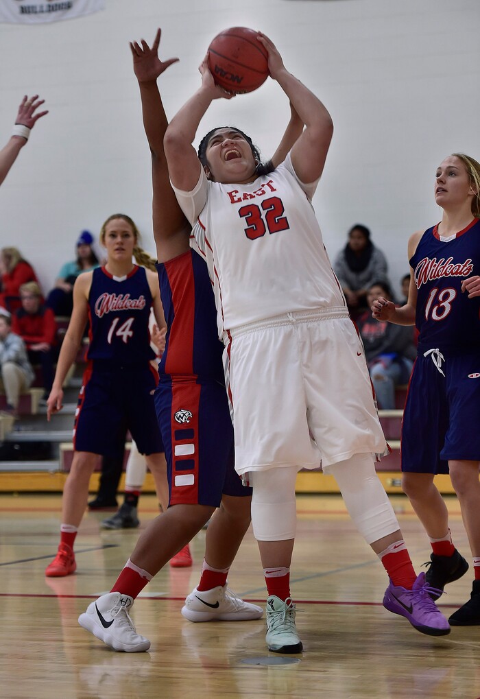(Scott Sommerdorf   |  The Salt Lake Tribune)   East's Lani Taliauli makes a power move during second half play. East beat Woods Cross 50-36, Friday, December 15, 2017.  