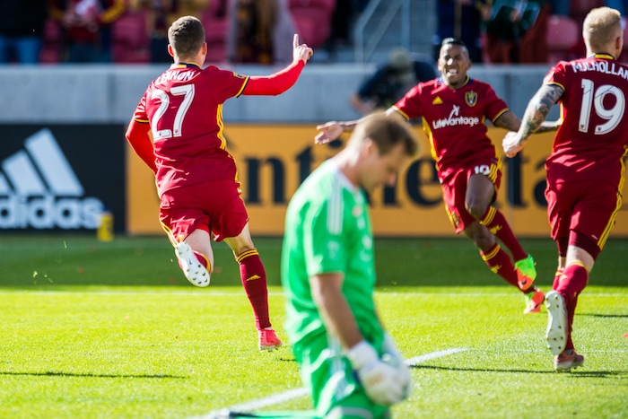 (Chris Detrick  |  The Salt Lake Tribune)  Real Salt Lake forward Brooks Lennon (27) celebrates after scoring a goal past Sporting Kansas City goalkeeper Andrew Dykstra (21) during the game at Rio Tinto Stadium Sunday, October 22, 2017.  