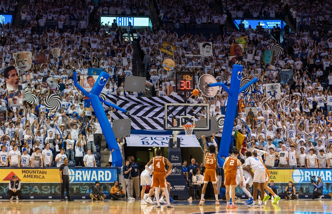 (Rick Egan | The Salt Lake Tribune) Brigham Young Cougars fans tru to distract Texas Longhorns forward Dillon Mitchell (23) as he shoots a free throw, in basketball action between the Brigham Young Cougars and the Texas Longhorns, at the Marriott Center, on Saturday, Jan. 27, 2024.