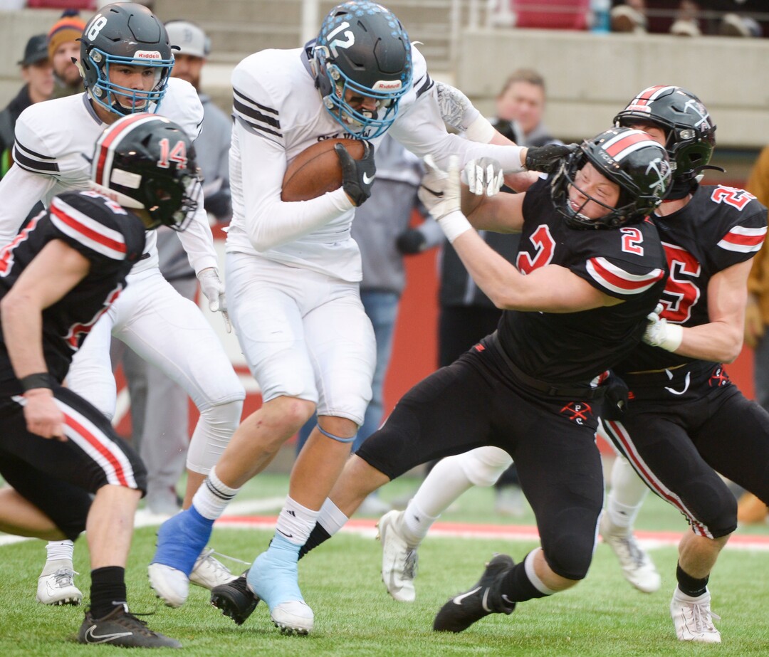 (Leah Hogsten  |  The Salt Lake Tribune)  Sky ViewÕs Mason Falslev shoves Park CityÕs Carson Tabaracci. Sky View High School defeated Park City 35-0 to win the 4A State Championship football title, Nov. 11, 2019 at Rice-Eccles Stadium.