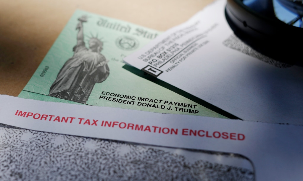 (Eric Gay | AP file photo)  In this April 23 photo, a stimulus check issued by the IRS to help combat the adverse economic effects of the COVID-19 outbreak, is displayed in San Antonio.