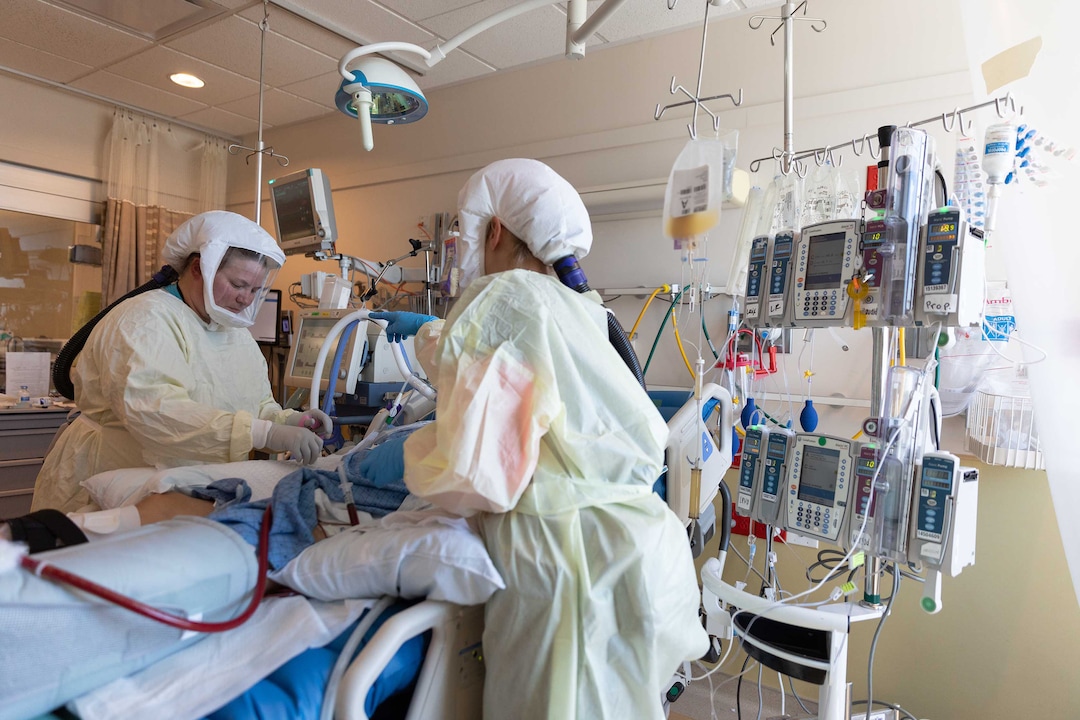 (photo courtesy Intermountain Healthcare) Hospital staff at Intermountain Medical Center in Murray care for patients with COVID-19 on June 9, 2020.