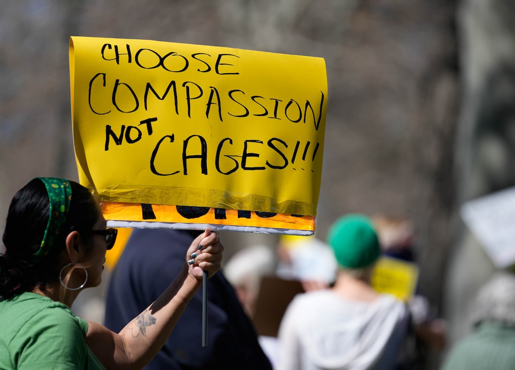 (Francisco Kjolseth  | The Salt Lake Tribune) Protesters gather outside the Governor’s Mansion in response the recent purchase of a Salt Lake City warehouse by ICE on Tuesday, March 17, 2026.