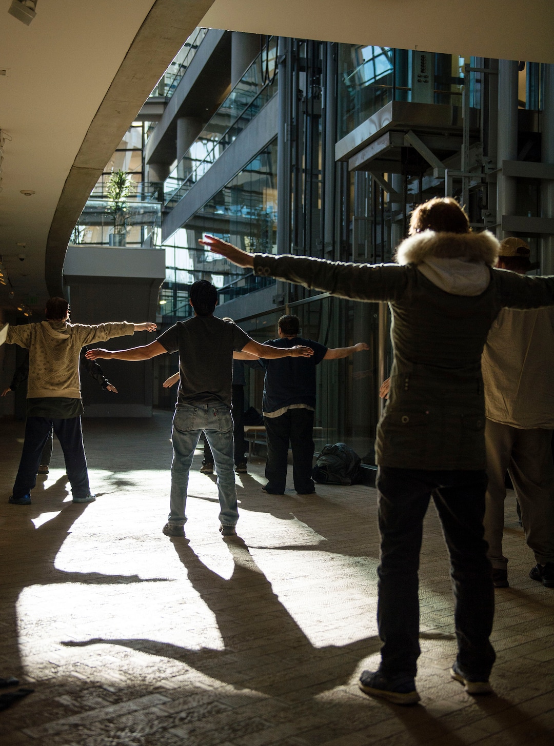 Lennie Mahler  |  The Salt Lake TribuneA group of homeless people practice tai chi at the Salt Lake City Public Library, Thursday, March 2, 2017.
