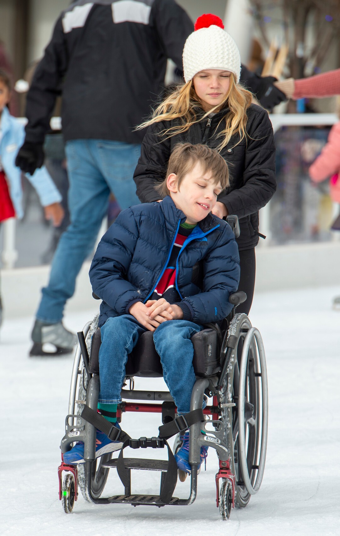 (Rick Egan  |  The Salt Lake Tribune)  Samantha Fuller skates with her friend Drake Becker at the Gallivan Center, on Christmas Eve, Tuesday, Dec. 24, 2019.