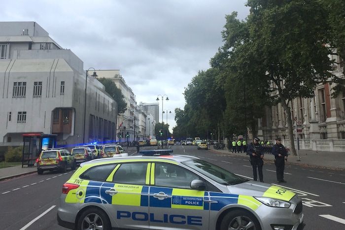 Armed police at the scene on Cromwell Gardens in London, near where people were injured after a car reportedly ploughed into people outside London's Natural History Museum, Saturday Oct. 7, 2017. Police say a number of people have been injured and one person has been detained at the scene. The crash happened at 2:20 p.m. on a day when the central London museum is usually teeming with pedestrians including international tourists .(Henry Vaughan/PA via AP)