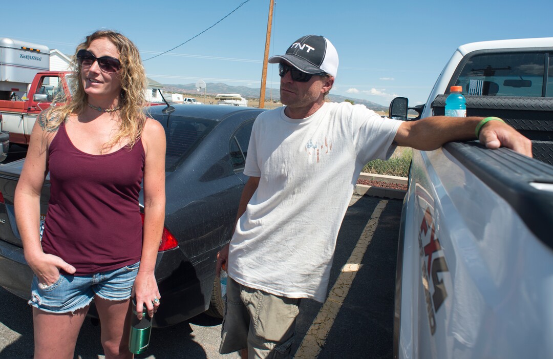 (Rick Egan  |  The Salt Lake Tribune)   Leila and Chad Hintze found out during a community meeting that their cabin burned to the ground in the fire. They're pictured in Fruitland, Tuesday, July 10, 2018.