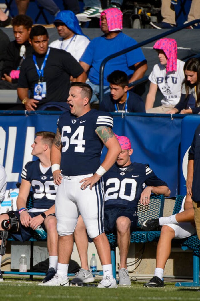 (Trent Nelson | The Salt Lake Tribune)  
Brigham Young Cougars long snapper Matt Foley (64) yawns on the sideline as BYU hosts Northern Illinois, NCAA football in Provo, Saturday Oct. 27, 2018.