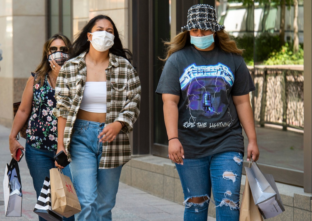 (Rick Egan  |  Tribune file photo) Pedestrians wear masks as they walk down Main Street in downtown Salt Lake City, on Thursday, Aug. 13, 2020.
