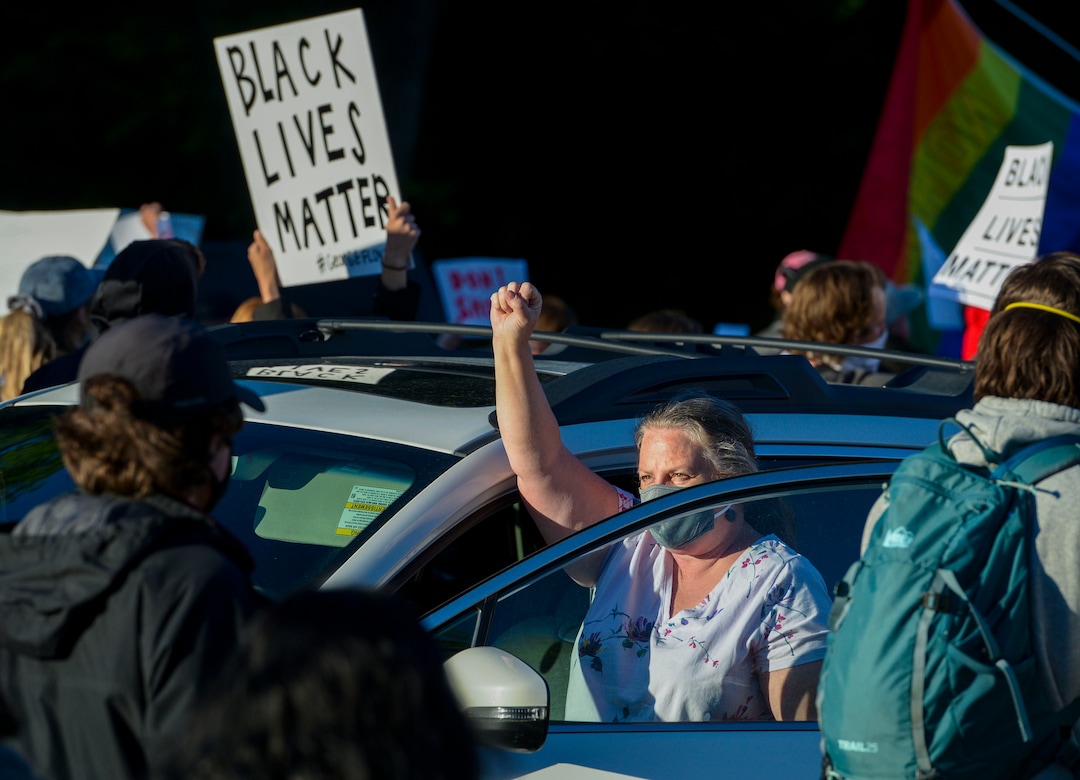 (Leah Hogsten  |  The Salt Lake Tribune) Demonstrators marched from the Utah Capitol down State Street, stopping at every intersection for five minutes in honor of George Floyd, June 8, 2020.