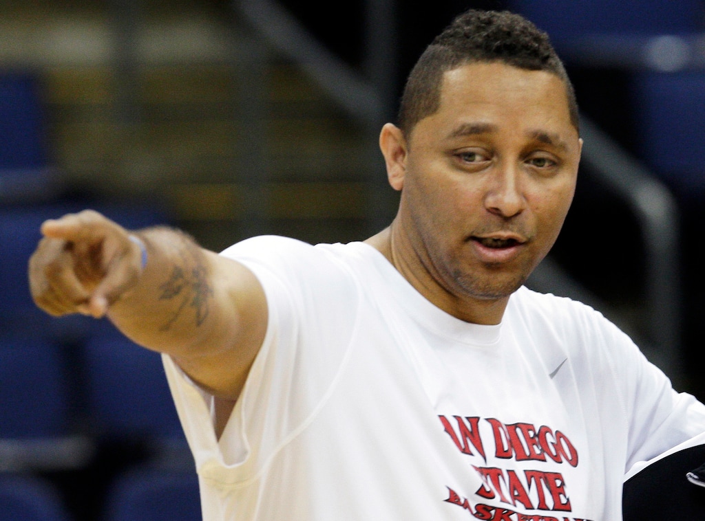FILE - In this March 15, 2012, file photo, San Diego State assistant coach Tony Bland, left, talks during NCAA college basketball practice in Columbus, Ohio. Bland, who is on suspension from his job as assistant at Southern California, appeared in a New York City courtroom on Tuesday, Oct. 10, 2017, in a case in which coaches and others are charged with using hundreds of thousands of dollars in bribes to influence the choices star athletes make about schools, sponsors, agents and financial advisers. (AP Photo/Tony Dejak, File)
