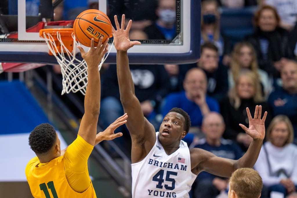 (Rick Egan | The Salt Lake Tribune)  San Francisco Dons forward Patrick Tape (11) shoots over Brigham Young Cougars forward Fousseyni Traore (45), in West Coast Conference action at the Marriott Center in Provo, on Thursday, Feb. 3, 2022. Traore was instrumental in the Cougars' win on Thursday.