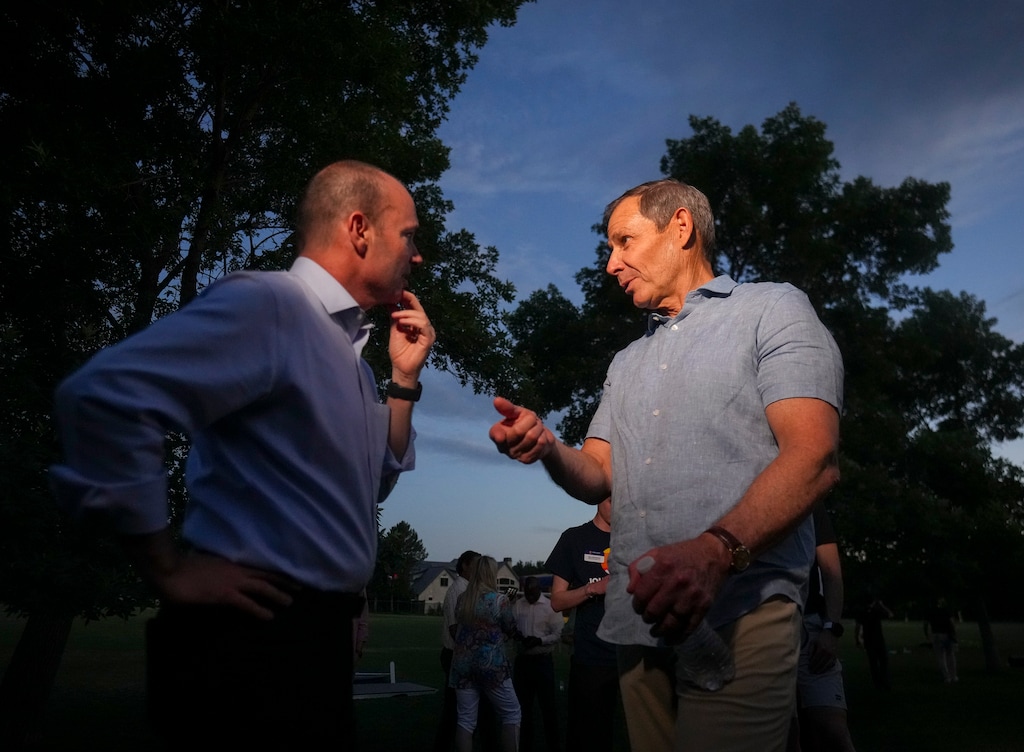 (Bethany Baker | The Salt Lake Tribune) U.S. Sen. Mike Lee, left, meets with U.S. Sen. candidate Rep. John Curtis during a watch party in Provo on Tuesday, June 25, 2024.