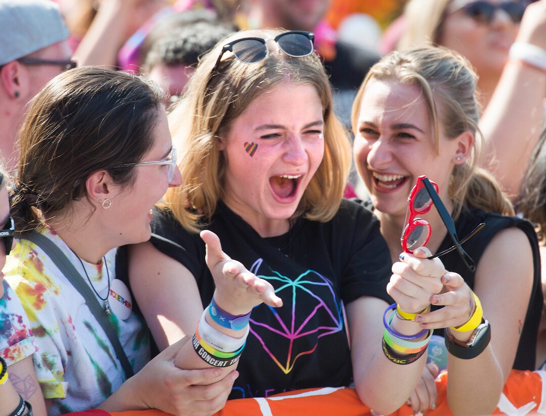 (Rick Egan  |  The Salt Lake Tribune)     Skylar Schlueter, Seatte, WA, reacts after catching Tyler Glenn's sun glasses, after he  tossed them into the crowd during his performance at the Loveloud Festival at Rice-Eccles Stadium, Saturday, July 28, 2018. 