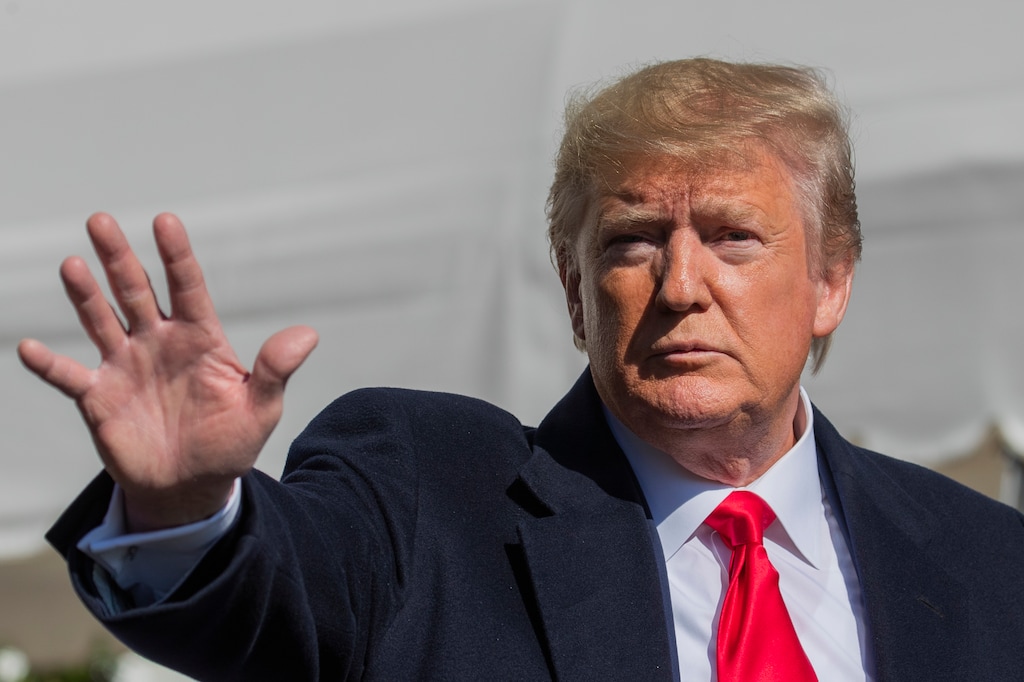 (Manuel Balce Ceneta | AP) President Donald Trump waves after speaking to reporters upon arrival at the White House in Washington, Sunday, Nov. 3, 2019.