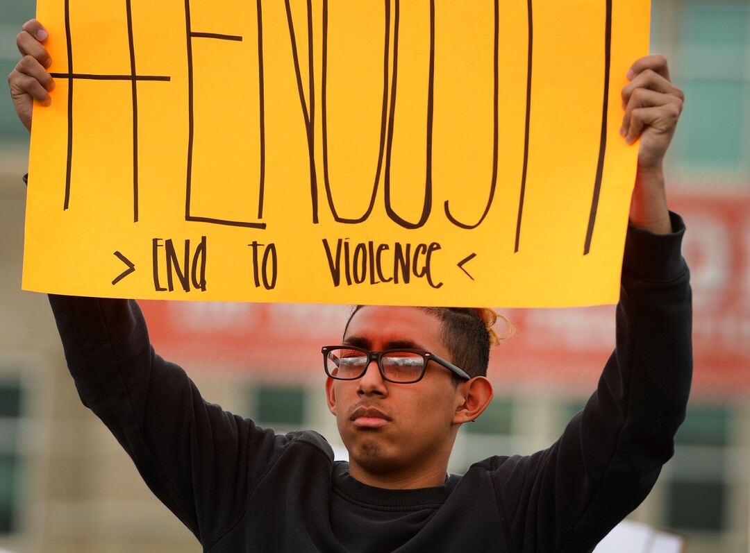 (Leah Hogsten  |  The Salt Lake Tribune) East High School student Brian Mancilla left school to raise awareness and push for change. Exactly one month after 17 people were killed at Marjory Stoneman Douglas High School in Parkland, survivors of the massacre joined tens of thousands of students across the United States by walking out of school,  Wednesday, March 14, 2018. 