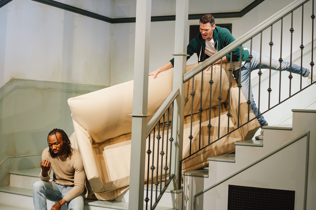 (Original X Productions) Pivot! Pivot! The couch is stuck on the stairs in the Friends Experience, which will end its run at The Gateway in Salt Lake City on Sunday, Jan. 28, 2024.