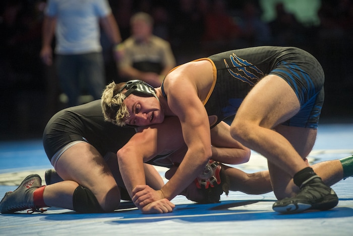 (Rick Egan  |  The Salt Lake Tribune)   Cooper Legas (Orem) wrestles Byron Anderson (DESERT HILLS) in the 195 weight class.  Legas won the match (Dec 7-5) in the 4A State Wrestling at UVU in Orem, Saturday, February 10, 2018.


