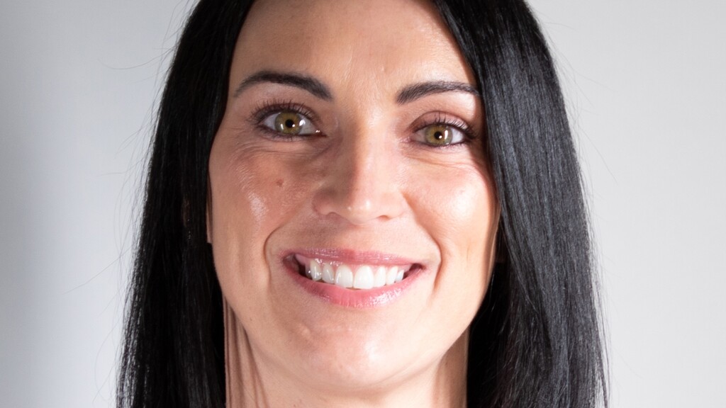 (Photo courtesy of Utah State Athletics)
Utah State women's basketball coach Kayla Ard has been released from the hospital after a condition forced doctors to put her in a medically induced coma.