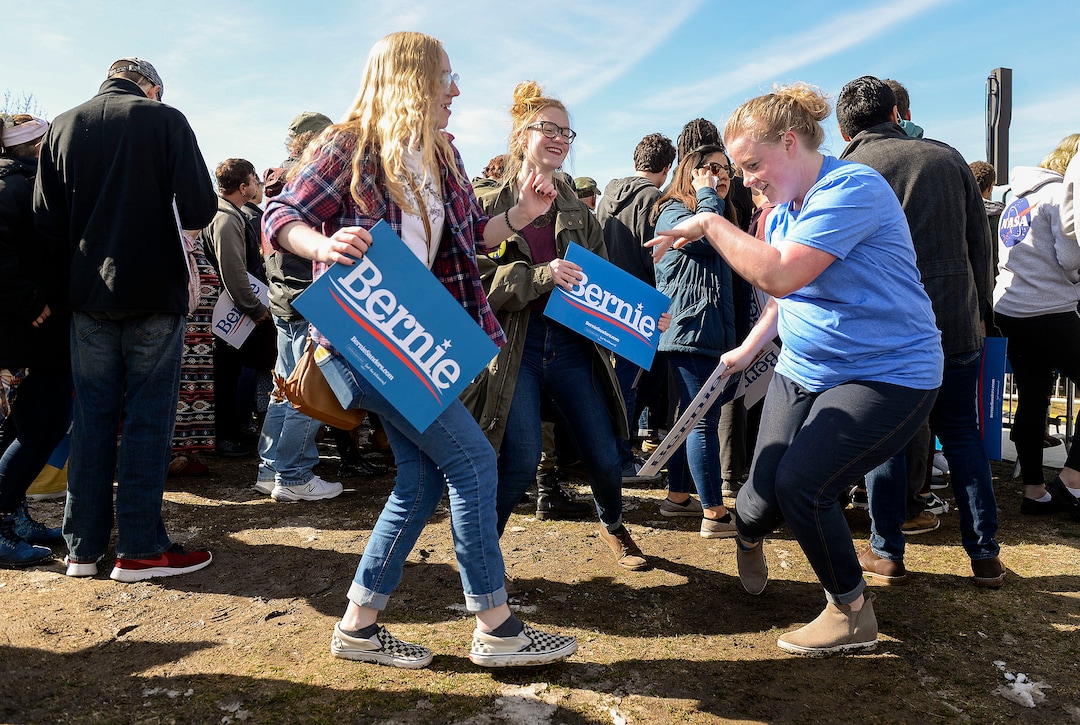 (Leah Hogsten  |  The Salt Lake Tribune) l-r Sister Anna Petty, Jane Petty and Olivia Petty from Pleasant Grove dance while waiting to see Presidential candidate, Vermont Sen. Bernie Sanders at a rally at Utah State Fairpark, Mar. 2, 2020, one day before UtahÕs Super Tuesday primary.
