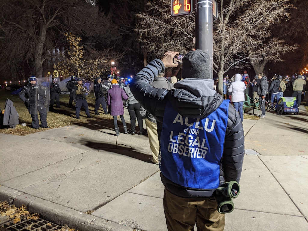 (Paighten Harkins | The Salt Lake Tribune)  An ACLU legal observer documents as Salt Lake City police move in to disperse a group of protesters occupying Washington Square Park on Sunday, Jan. 5, 2020. More than a dozen people were arrested.