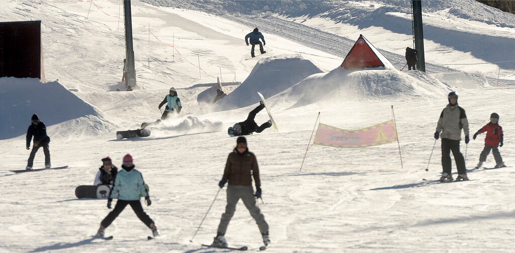 (Al Hartmann  |  Tribune file photo) Beginner skiers make their way down the slope  at Brighton Ski Resort in this 2014 photo.
