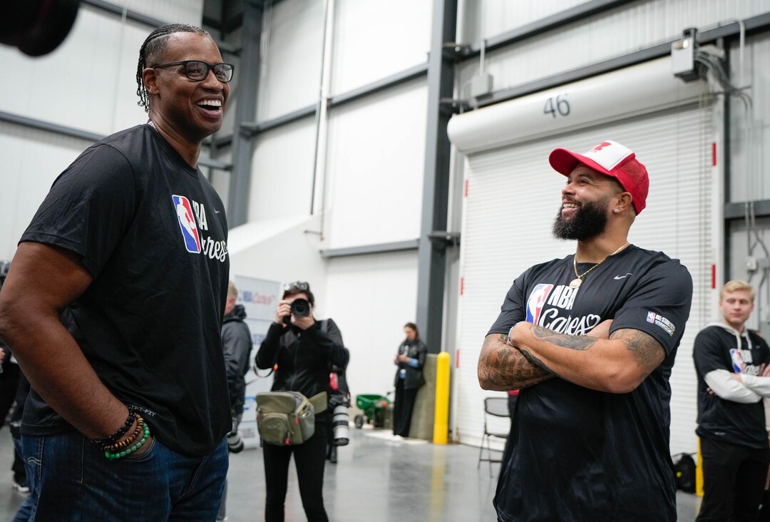 (Francisco Kjolseth | The Salt Lake Tribune) Jason Collins, left, a community ambassador for NBA Cares, greets former Utah Jazz player Deron Williams as they get ready to join hundreds of NBA volunteers for the NBA Cares Day of Service in Salt Lake City on Feb. 17, 2023.
