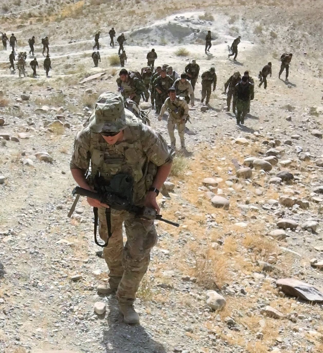 (Facebook) "Ruck march up some tough terrain. Ruck marches always seem to go in one direction: UP" This photo was posted in a public Facebook group on Oct. 17, 2018, by North Ogden Mayor and National Guardsman Brent Taylor, who has been killed in Afghanistan.