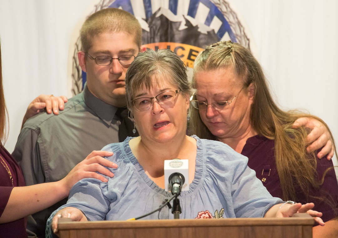 (Rick Egan  |  The Salt Lake Tribune)  Jeanne Long, sister of homicide victim Valerie Sue Brantzeg, is flanked by family members as she speaks at a news conference about her sister, at the Salt Lake County Sheriff's Office, Friday, Sept. 7, 2018. Formal charges have been filed against Walter Eugene Brantzeg, Valerie's estranged husband, in her death.