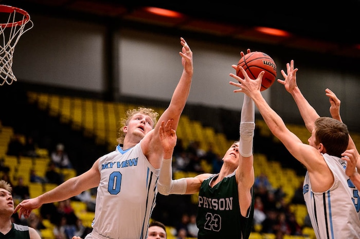 (Trent Nelson | The Salt Lake Tribune)  Payson vs. Sky View, 4A State high school basketball tournament at Utah Valley University in Orem, Thursday March 1, 2018. Sky View's Andrew Dean (0) and Payson's Hagen Wright (23).