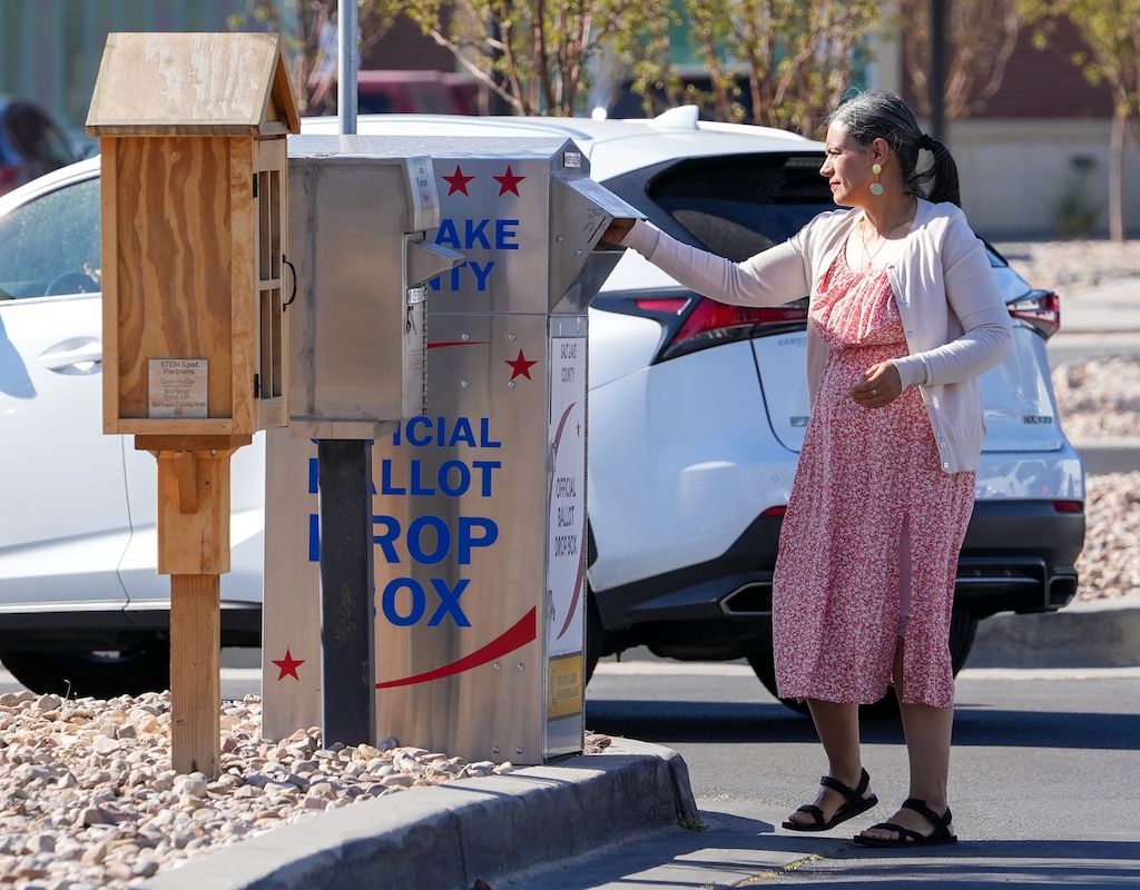 (Chris Samuels | The Salt Lake Tribune) A ballot is placed in a drop box in Riverton on Tuesday, Aug. 12, 2025.