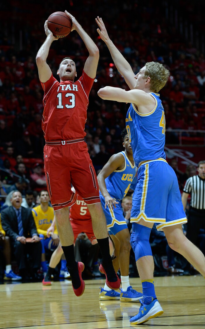 (Francisco Kjolseth  |  The Salt Lake Tribune)  Utah Utes forward David Collette (13) goes up against UCLA Bruins center Thomas Welsh (40) as the University of Utah hosts UCLA in NCAA basketball at the Huntsman Center in Salt Lake City, Thursday, Feb. 22, 2018.