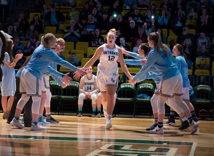 Scott Sommerdorf | The Salt Lake TribuneLauren Gustin is introduced during pre game. Gustin scored 32 points and led Salem Hills as they beat Hurricane 57-35 for the 4A girl's title, Saturday, March 3, 2018.