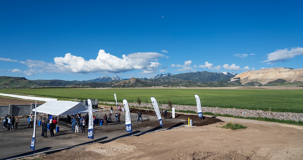 (Michael Mangum | Special to The Tribune) A tree planting ceremony sits in front of a vast wheat field at the site of the proposed Olympia Hills development project near Herriman, on Saturday, June 22, 2019. The event celebrated the proposed Bastian Agricultural Center as part of the proposed development of the land.