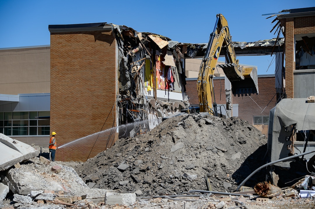 (Francisco Kjolseth  |  The Salt Lake Tribune)  Work begins tearing down the old West Jordan Middle School, 7550 S. Redwood Road, the oldest school in the Jordan School District on Tuesday, July 16, 2019.