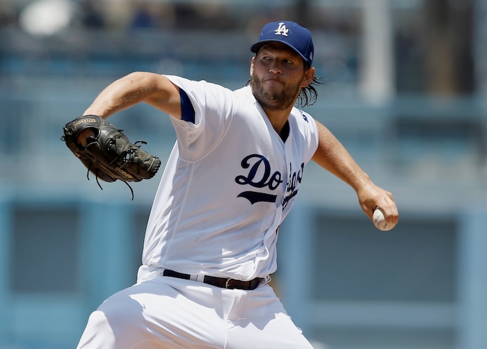 Los Angeles Dodgers starting pitcher Clayton Kershaw throws to the plate during the first inning of a baseball game against the Atlanta Braves in Los Angeles, Sunday, July 23, 2017. (AP Photo/Alex Gallardo)