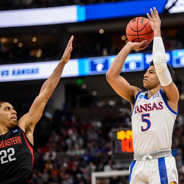 (Trent Nelson | The Salt Lake Tribune)  
Kansas Jayhawks guard Quentin Grimes (5) shoots over Northeastern Huskies guard Donnell Gresham Jr. (22) as Kansas faces Northeastern in the 2019 NCAA Tournament in Salt Lake City on Thursday March 21, 2019.