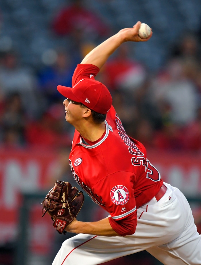 Los Angeles Angels starting pitcher Troy Scribner throws during the second inning of a baseball game against the Texas Rangers, Thursday, Aug. 24, 2017, in Anaheim, Calif. (AP Photo/Mark J. Terrill)