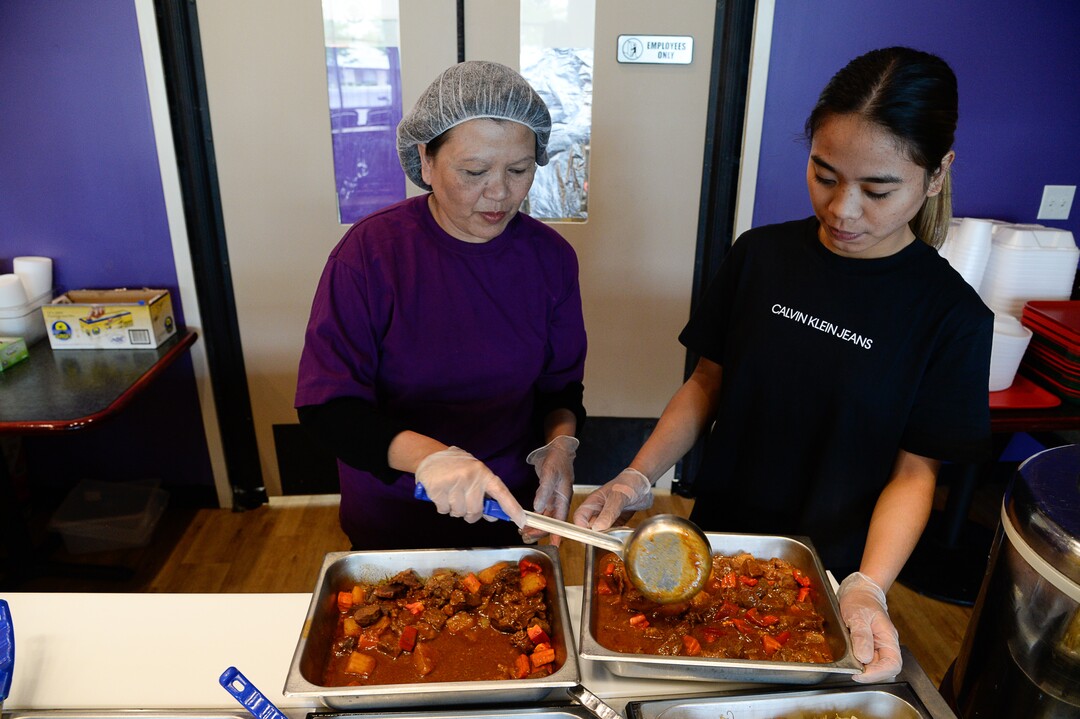 (Francisco Kjolseth  |  The Salt Lake Tribune)  Yaye Sherer, left, and Arlene Orani make sure the lunch options fully stocked at BFF Turon, a new Filipino restaurant in West Jordan that serves up turo-turo or cafeteria style food.