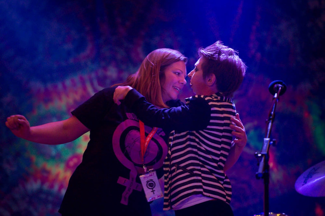 (Trent Nelson | The Salt Lake Tribune)   Camp director Hillary McDaniel embraces Sara Johnson after Johnson's performance at Rock Camp for Womyn's showcase on Feb. 4. Campers learned how to play instruments, form bands, write songs, and perform live in concert — all in three days. It's a new program by the same group that does Rock and Roll Camp for Girls.