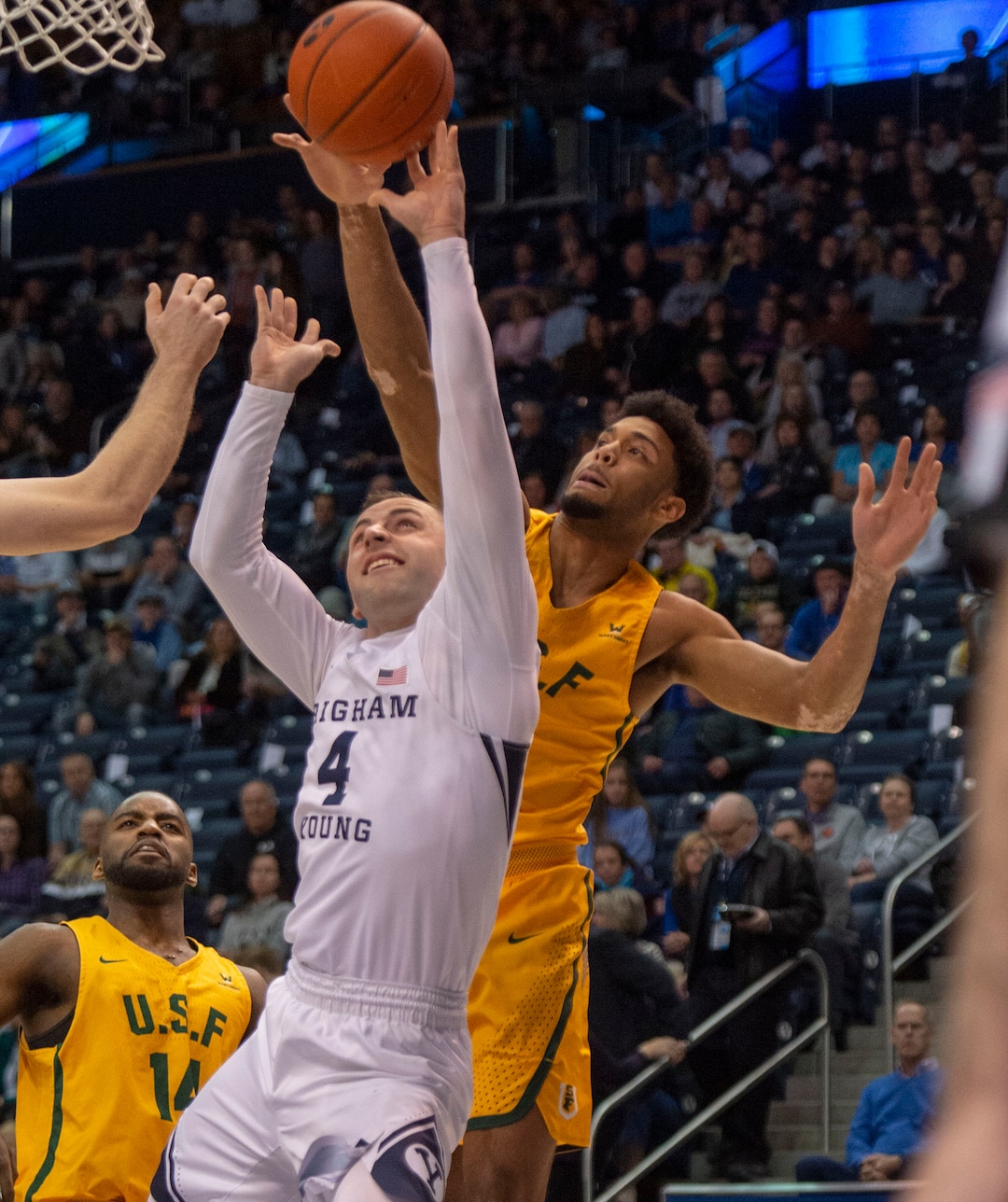 (Rick Egan  |  The Salt Lake Tribune)  San Francisco Dons forward Nate Renfro (15) blocks a shot by Brigham Young Cougars guard Nick Emery (4), in WCC basketball action at the Marriott Center, Thursday, February 21, 2018.