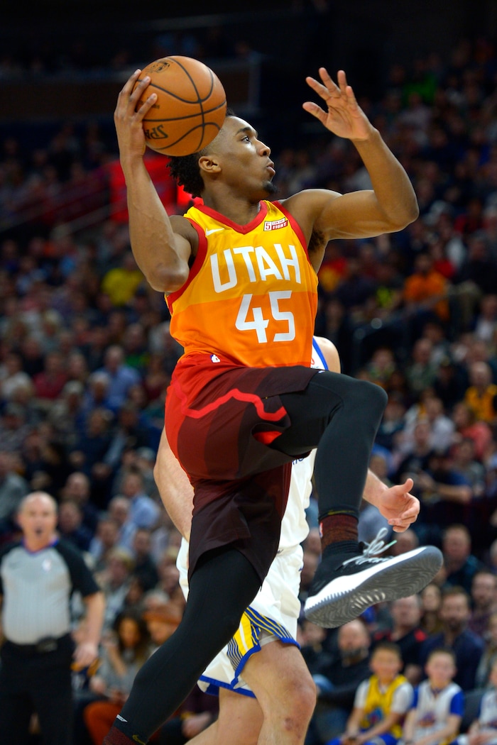 (Steve Griffin  |  The Salt Lake Tribune) Utah Jazz guard Donovan Mitchell (45) glides to the hoop for two points during the Utah Jazz versus Golden State Warriors at Vivint Smart Home Arena in Salt Lake City Tuesday January 30, 2018.