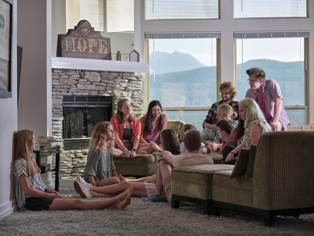 (Lindsay D'addato | The New York Times) A group of Grinnell College, Iowa, students in the dining room of their own off-campus housing group in Salt Lake City, Aug. 25, 2020. As the fall semester begins, many college students will be attending classes from the relative safety of their family homes, others have arrived to live on university campuses, and some students are pursuing a third option: Renting giant houses with friends — sometimes in far-flung locales — and doing school remotely, together. Call it the rise of the college "collab house."